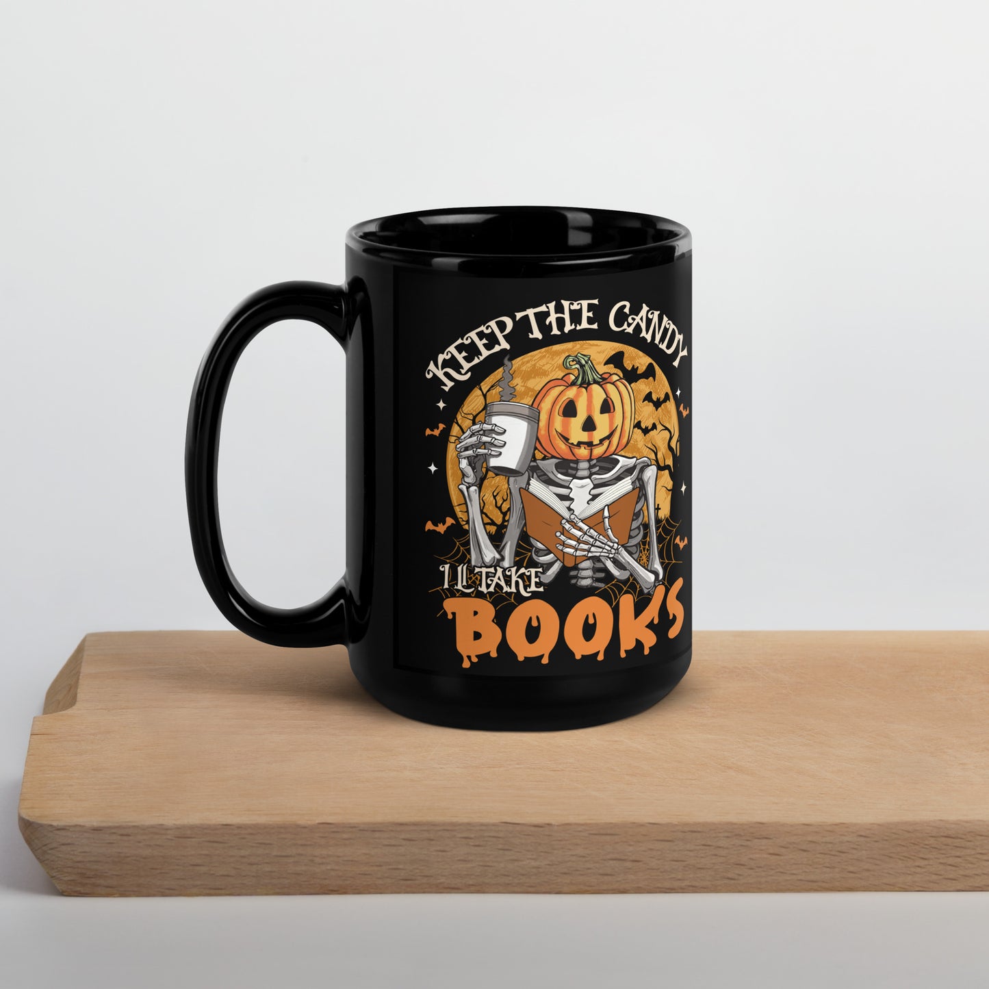 Black Mug with Halloween Pumpkin Design - "Keep the Candy, I'll Take the Books