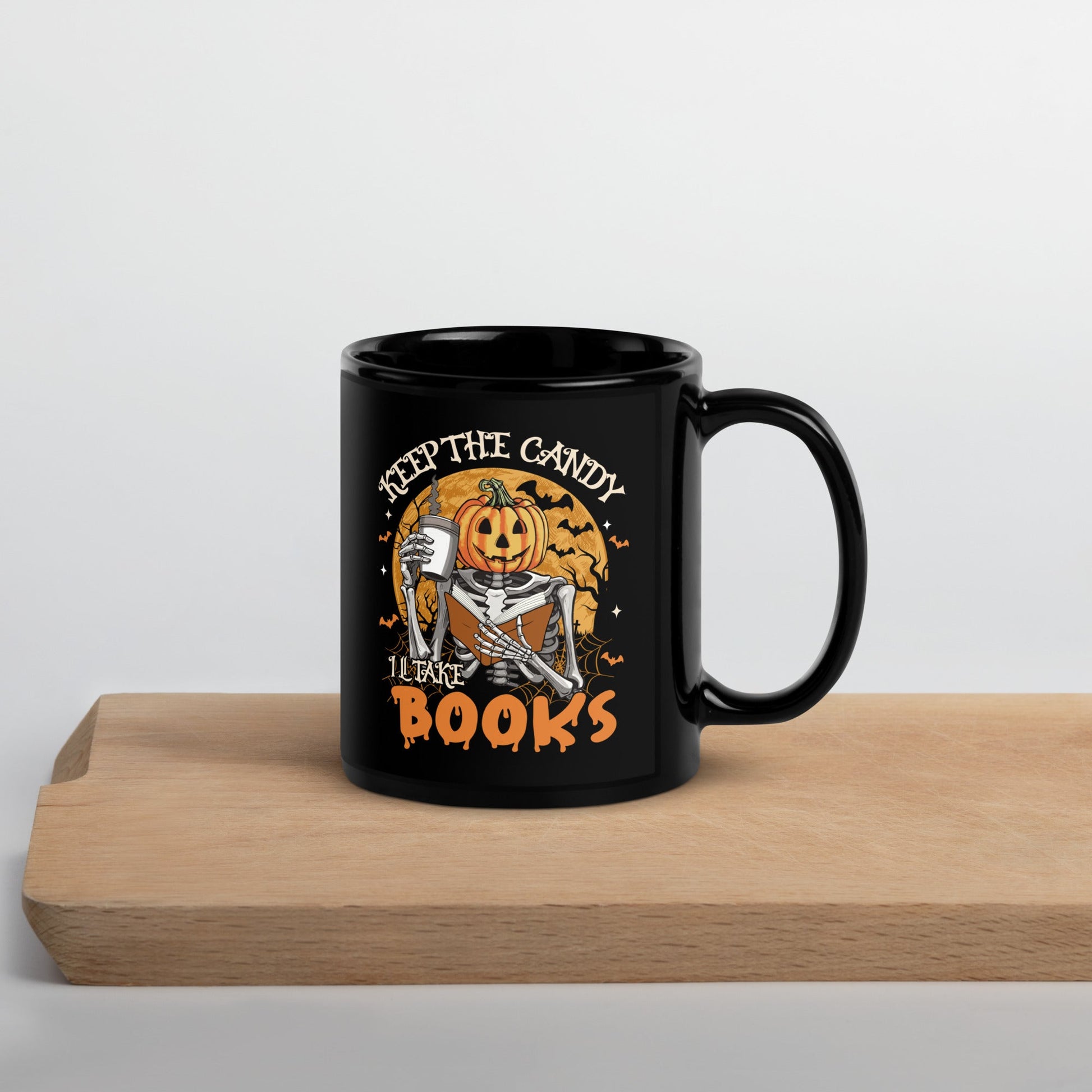 Black Mug with Halloween Pumpkin Design - "Keep the Candy, I'll Take the Books - Sublimegifts4u.com