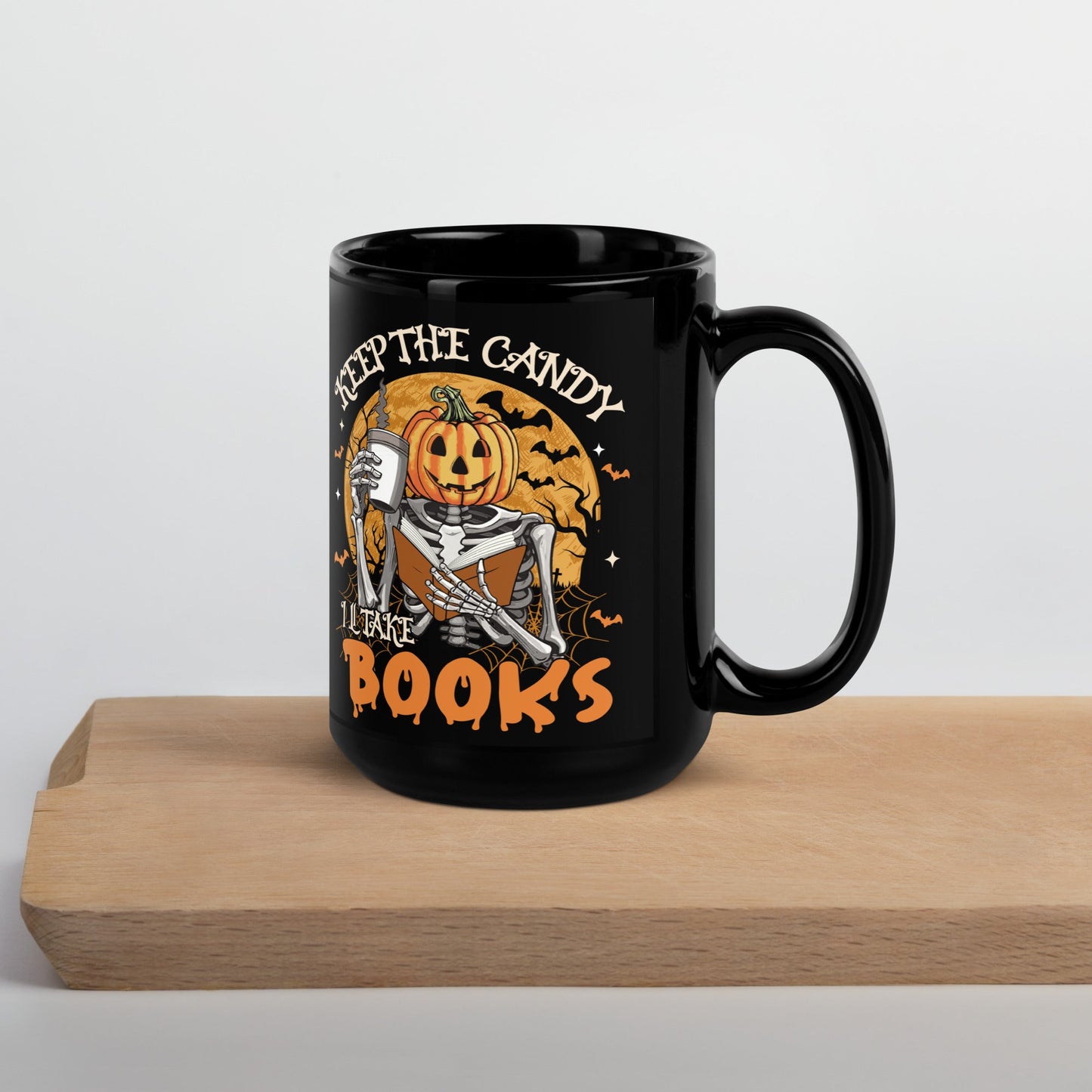 Black Mug with Halloween Pumpkin Design - "Keep the Candy, I'll Take the Books - Sublimegifts4u.com