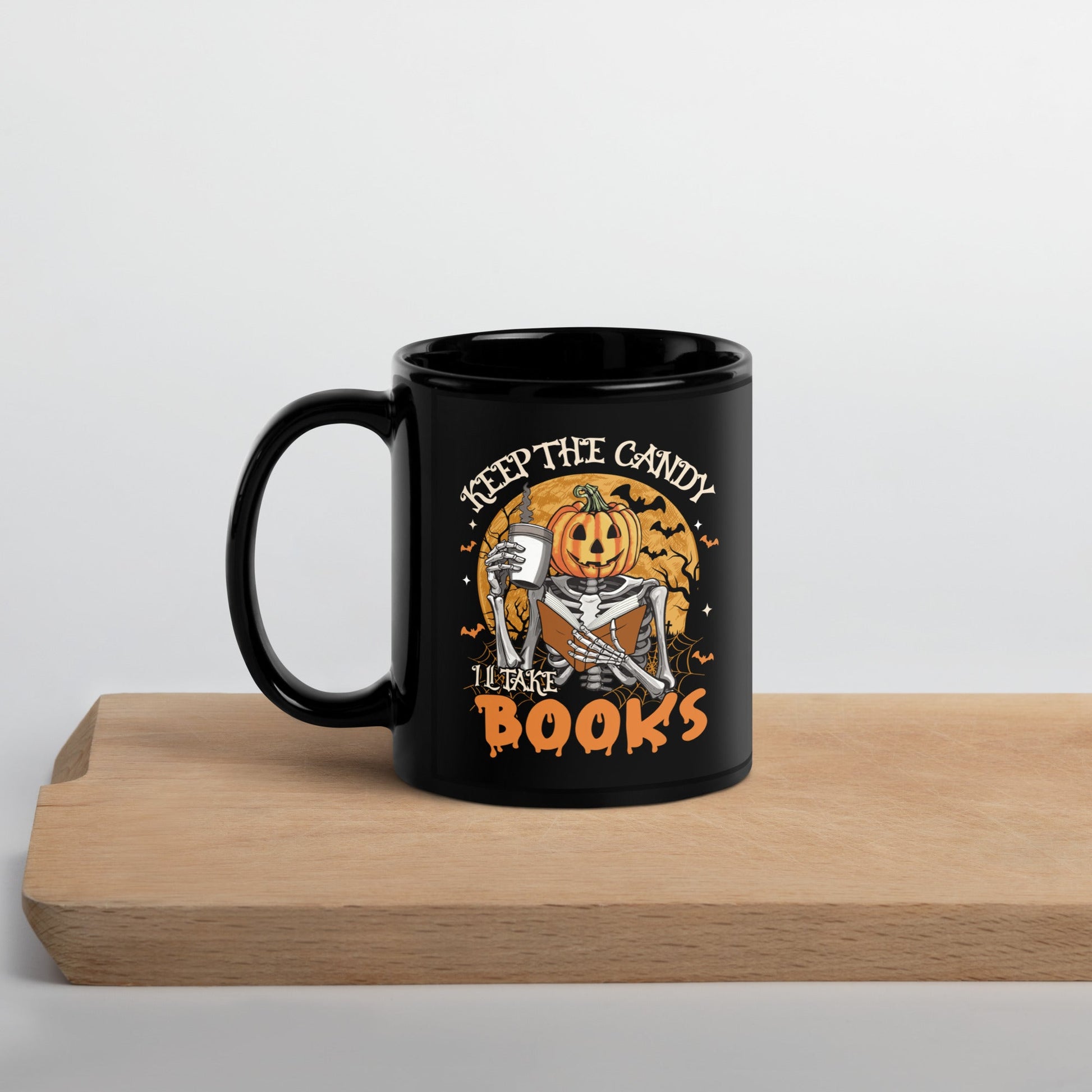 Black Mug with Halloween Pumpkin Design - "Keep the Candy, I'll Take the Books - Sublimegifts4u.com