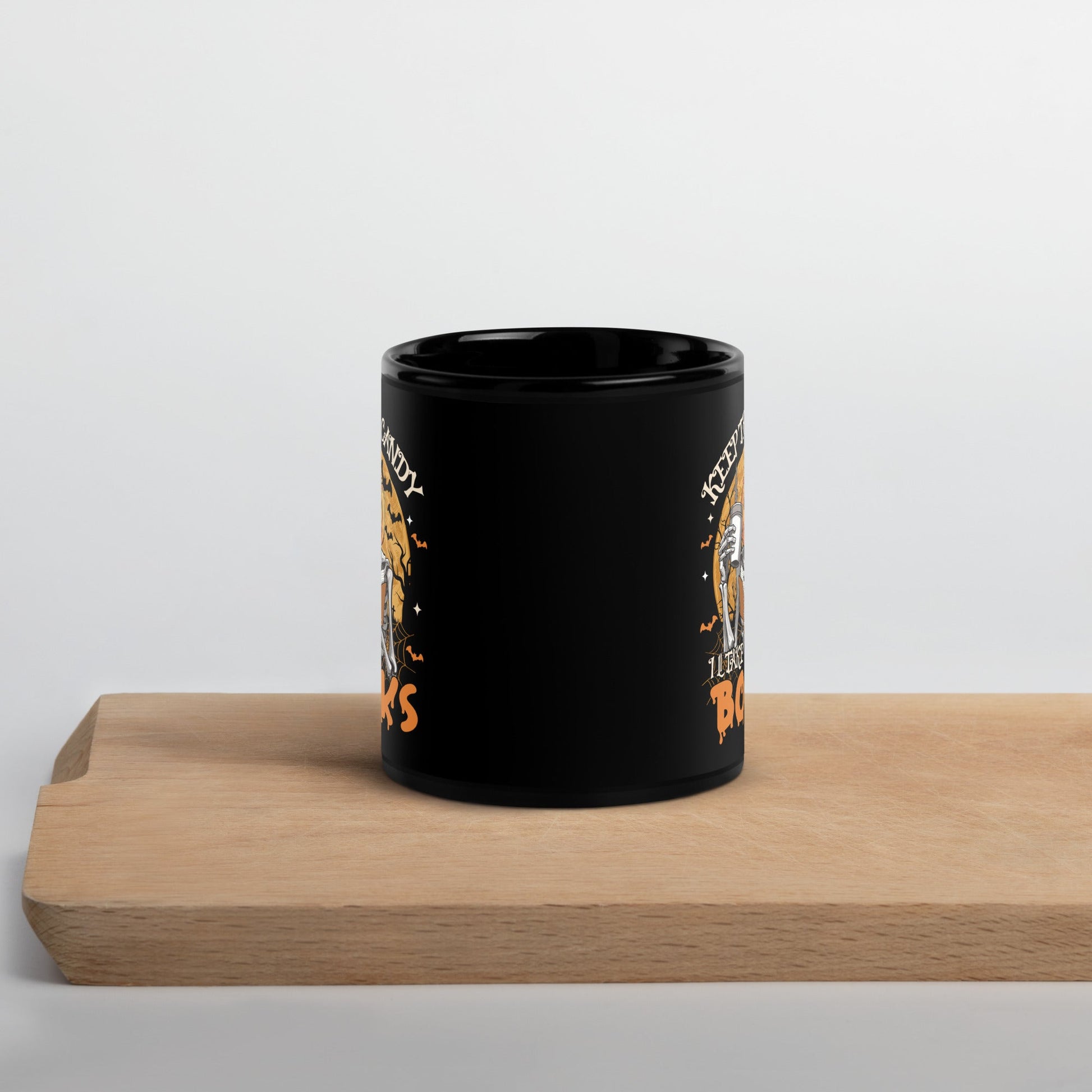 Black Mug with Halloween Pumpkin Design - "Keep the Candy, I'll Take the Books - Sublimegifts4u.com