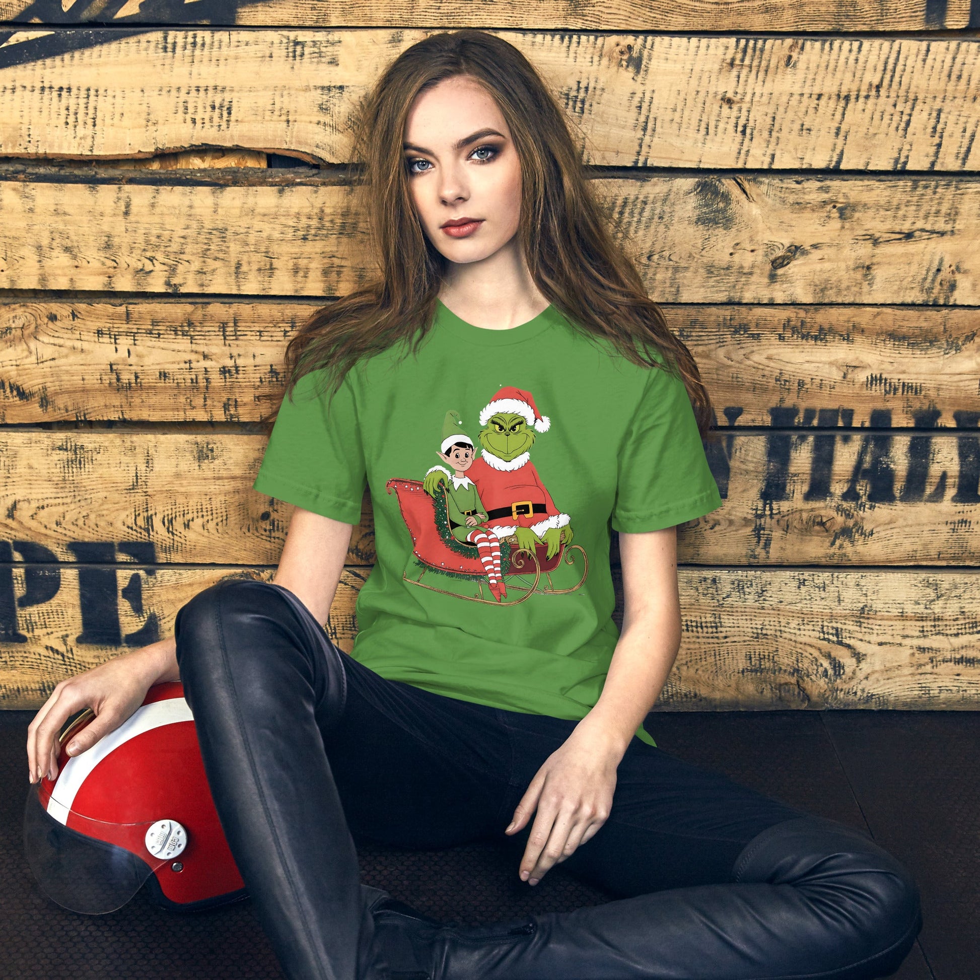 Women’s Holiday T-Shirt – Grumpy Grinch and Playful Elf on Sleigh - Sublimegifts4u.com