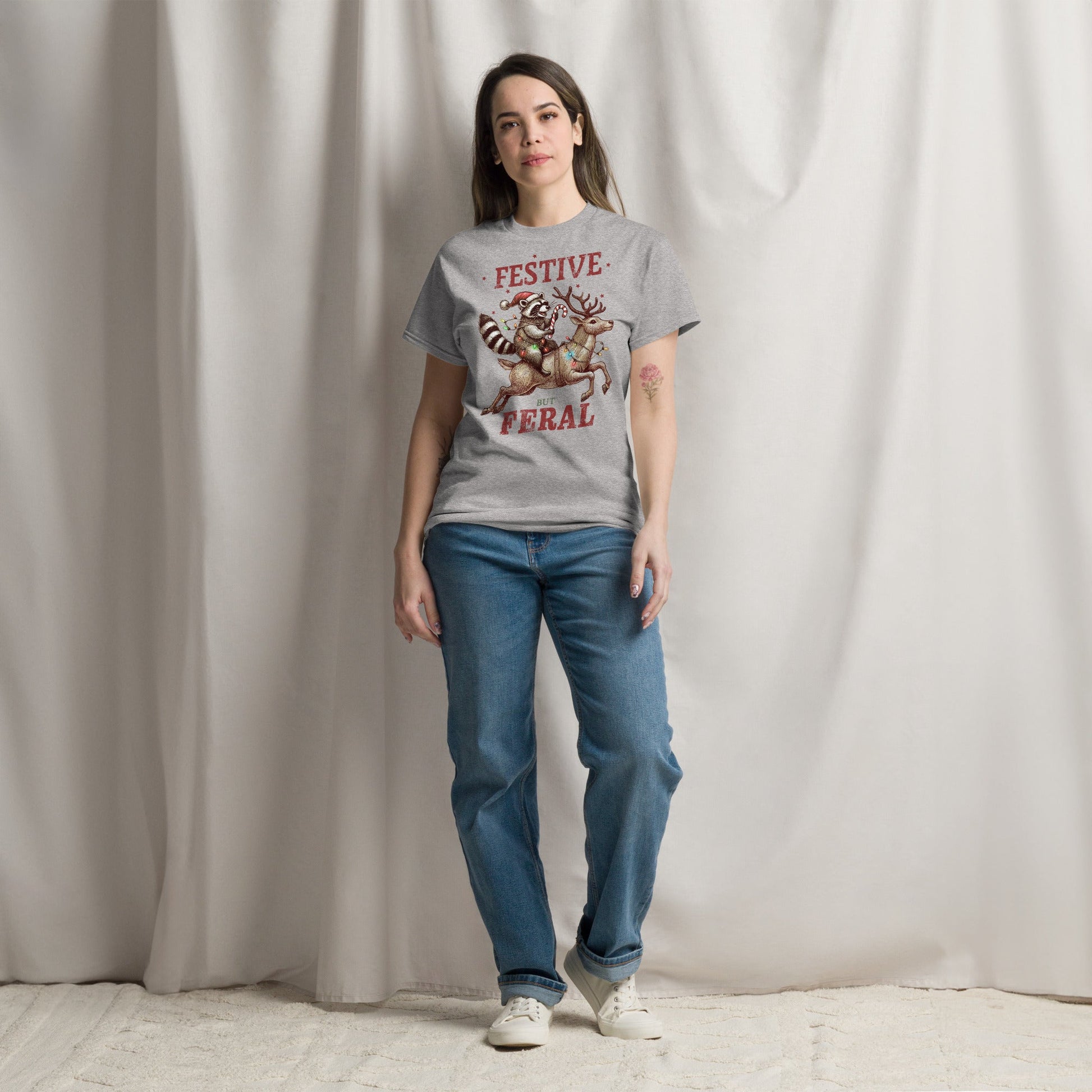 Women’s Tee | 'Festive But Feral' with Raccoon on Reindeer | Fun Holiday Shirt - Sublimegifts4u.com